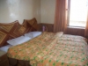 Room at hotel River West Manali